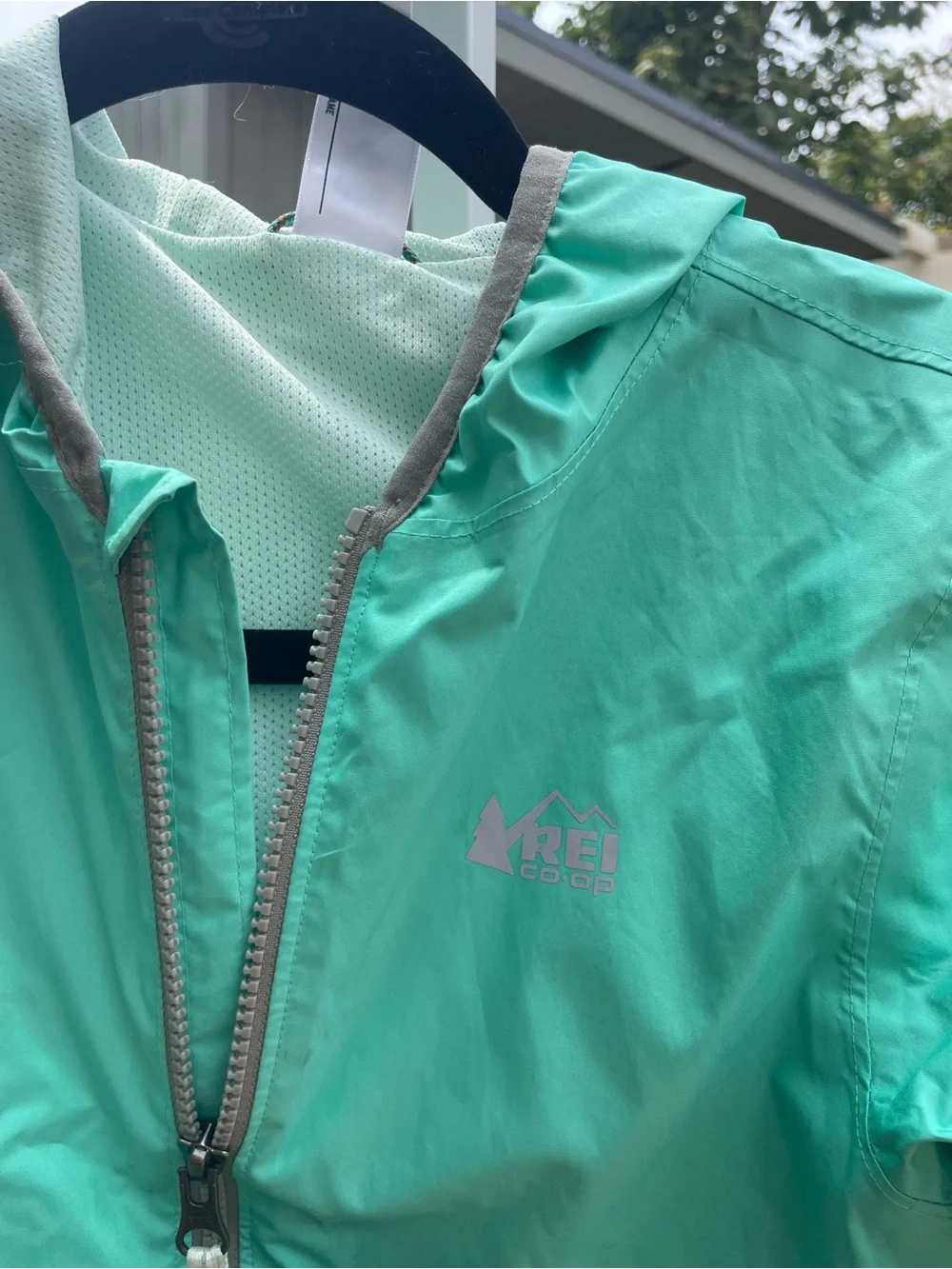REI Kids' Hooded rain Jacket in Teal Green
